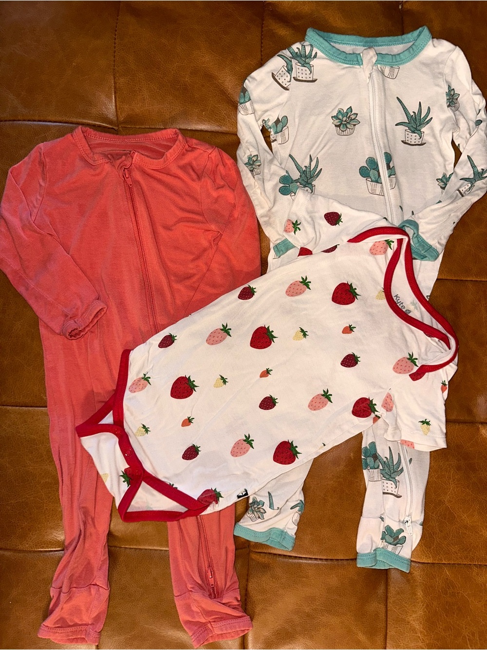 Kyte BABY Coral Zip Footed Pajama + White Succulent & Strawberry Print Set